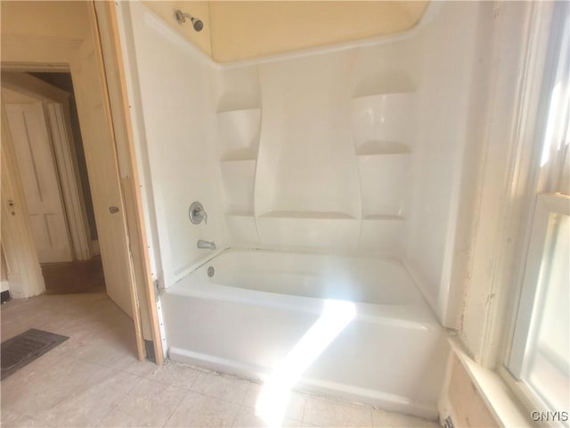 bathroom with shower / bath combination