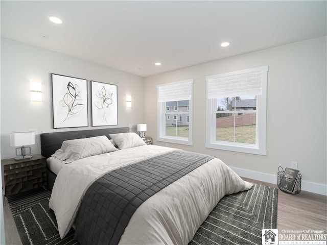 bedroom with light hardwood / wood-style floors