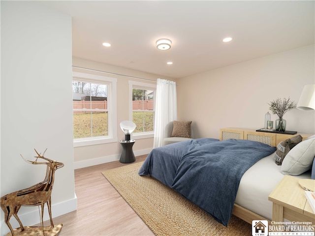 bedroom featuring light hardwood / wood-style floors