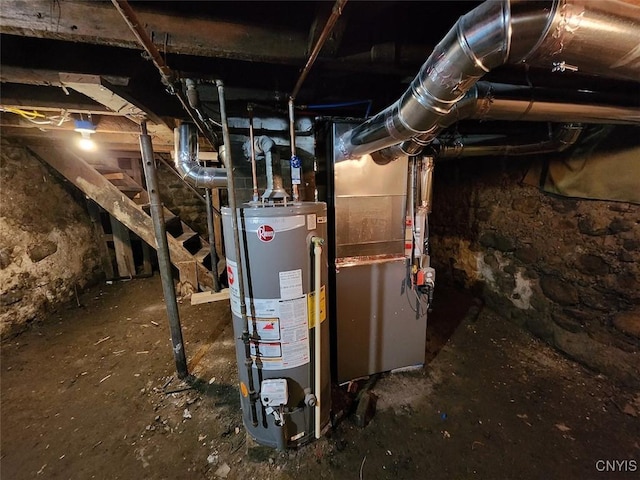 utility room featuring water heater