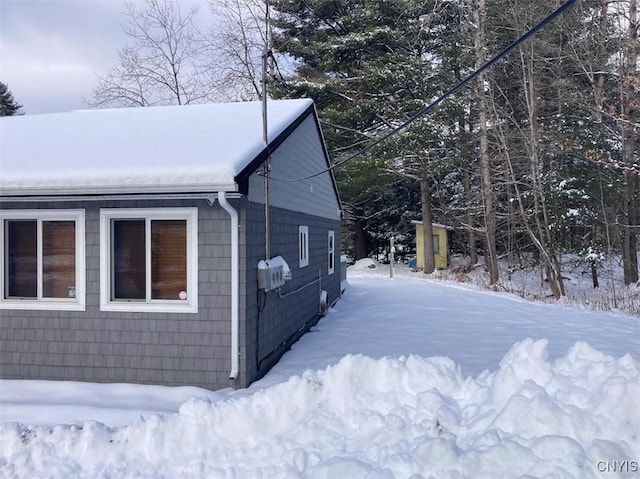 view of snow covered property