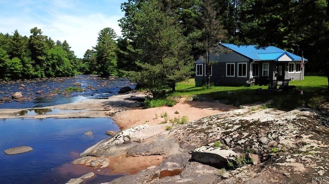 view of yard with a water view