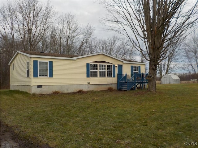 view of home's exterior with a yard and a deck