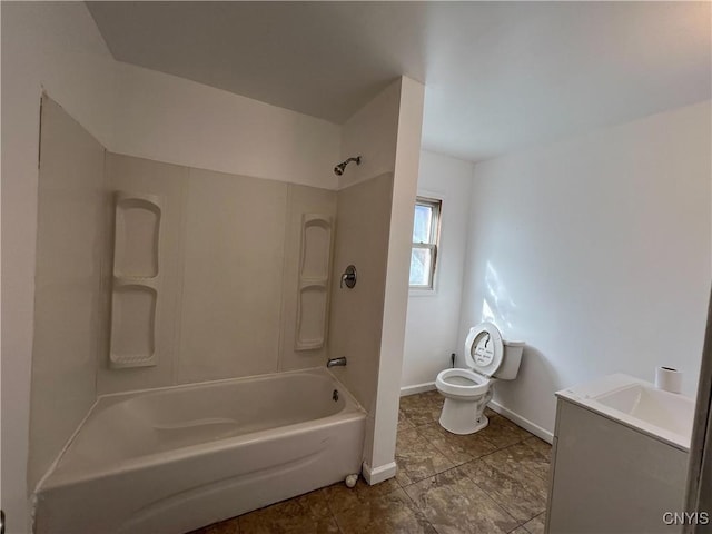 full bathroom with vanity, washtub / shower combination, and toilet