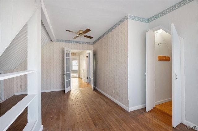 corridor with wood-type flooring