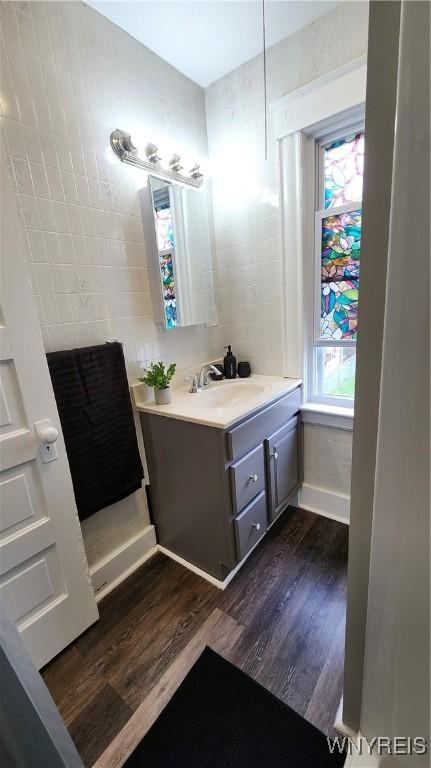 bathroom featuring hardwood / wood-style floors and vanity