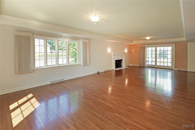 unfurnished living room featuring dark wood-type flooring