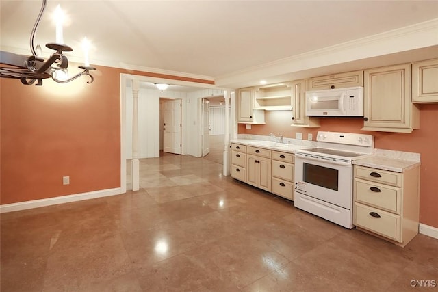 kitchen with sink, cream cabinetry, white appliances, and ornamental molding