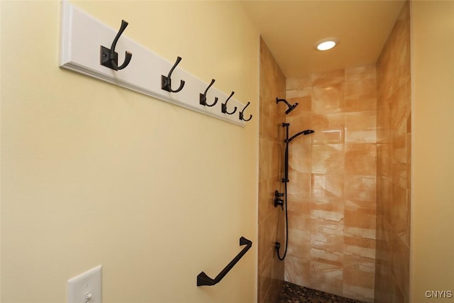 bathroom featuring tiled shower