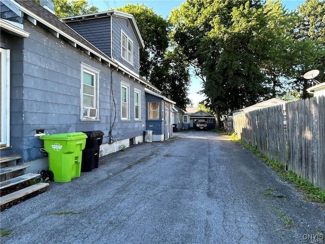 view of home's exterior with cooling unit