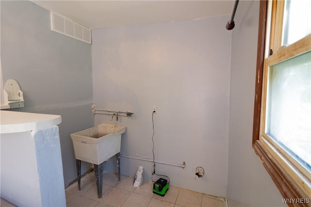 bathroom featuring tile patterned flooring