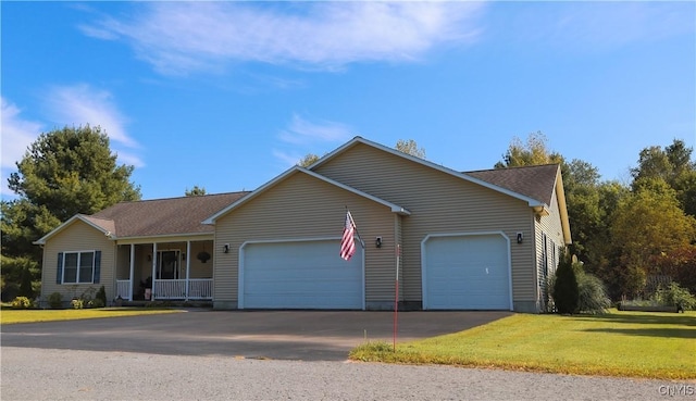 single story home featuring a front yard and a garage