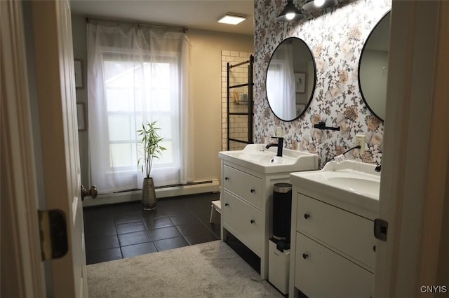 bathroom with tile patterned floors, vanity, and a baseboard radiator