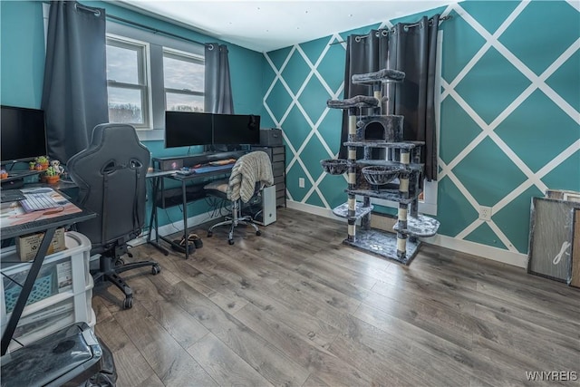 home office with wood-type flooring