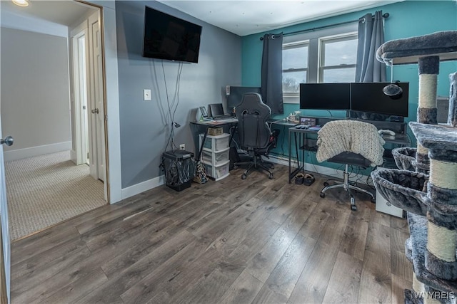 home office with hardwood / wood-style flooring