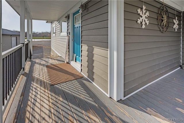 wooden terrace with covered porch