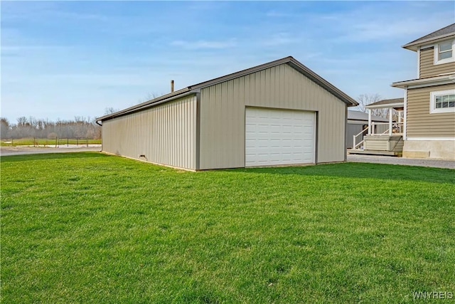 garage with a yard