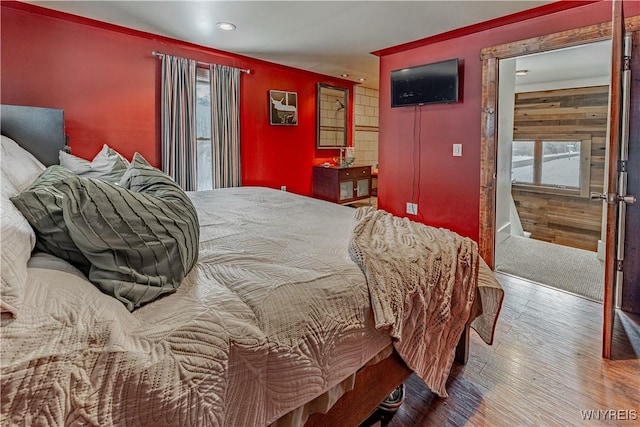 bedroom featuring wood-type flooring