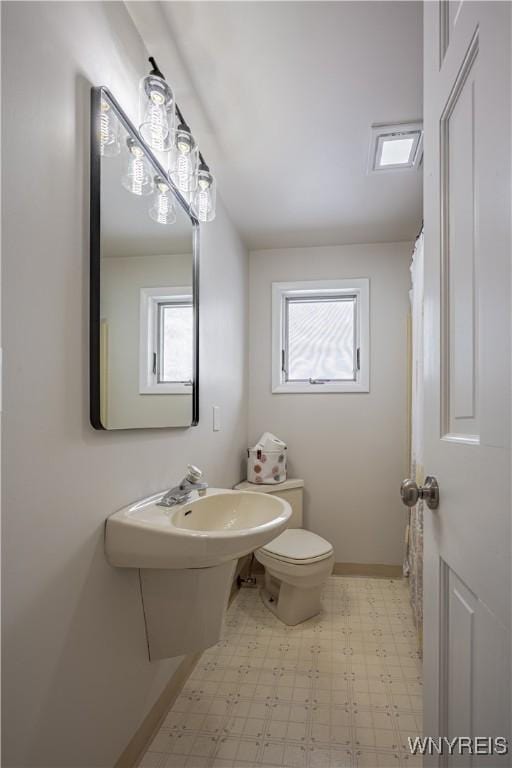 bathroom with sink and toilet