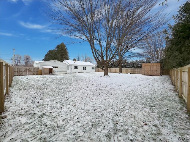 view of yard covered in snow