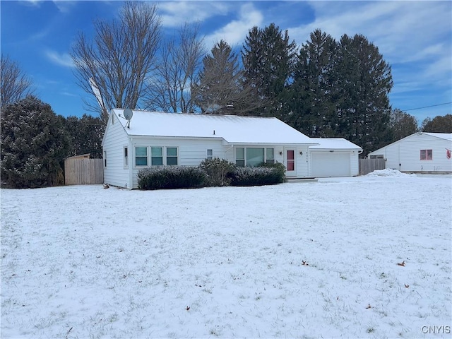 view of snow covered house