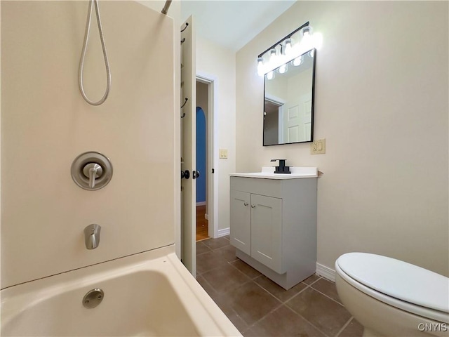 full bathroom with shower / washtub combination, tile patterned flooring, vanity, and toilet