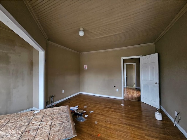 interior space featuring crown molding and dark hardwood / wood-style flooring