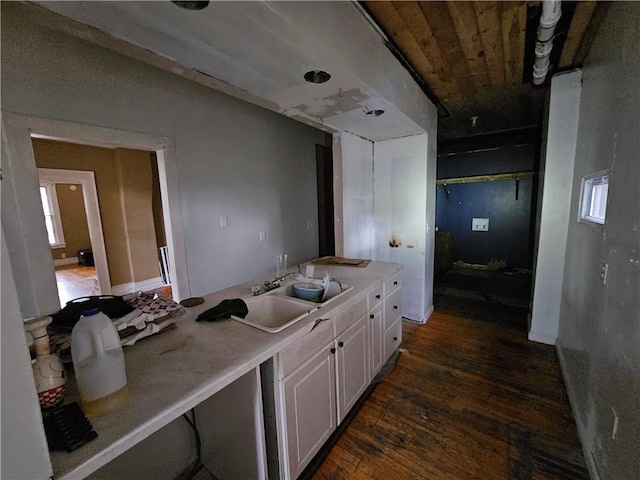 interior space featuring wood ceiling, a healthy amount of sunlight, and hardwood / wood-style flooring