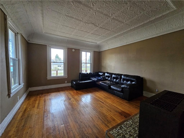 unfurnished living room featuring hardwood / wood-style floors