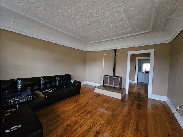 living room with hardwood / wood-style floors and ornamental molding