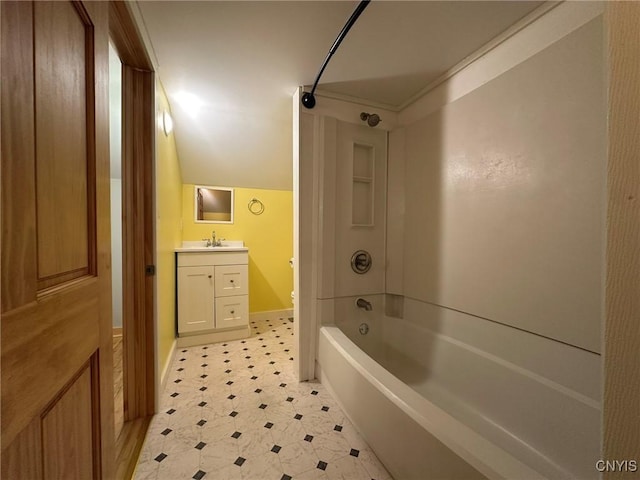 full bathroom featuring crown molding, vaulted ceiling, toilet, shower / tub combination, and vanity