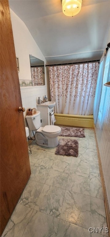 full bath with toilet, marble finish floor, shower / bath combo with shower curtain, and vaulted ceiling