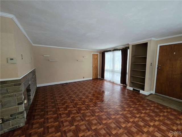 unfurnished living room featuring baseboards, a fireplace, and ornamental molding