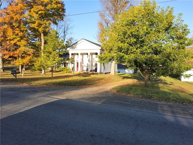 view of front of home with a front yard