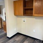 laundry room featuring hookup for a washing machine and dark wood-type flooring