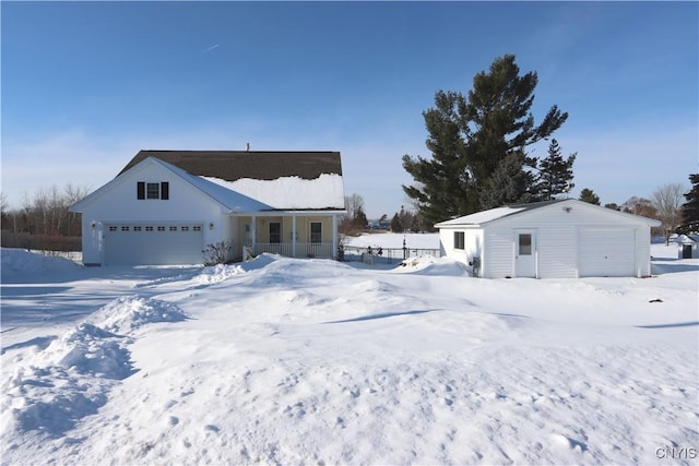 ranch-style house with a porch and a garage