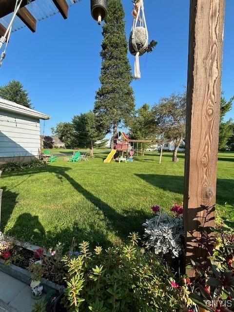 view of yard with a playground