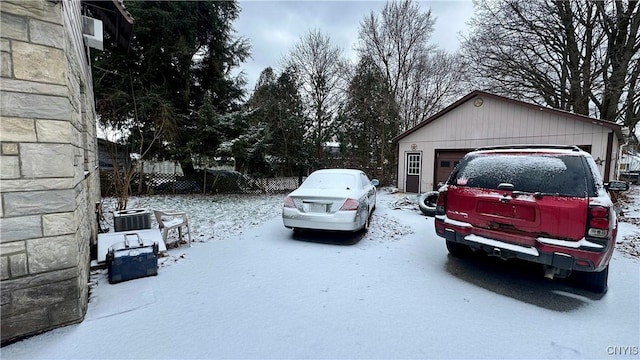 view of snow covered garage