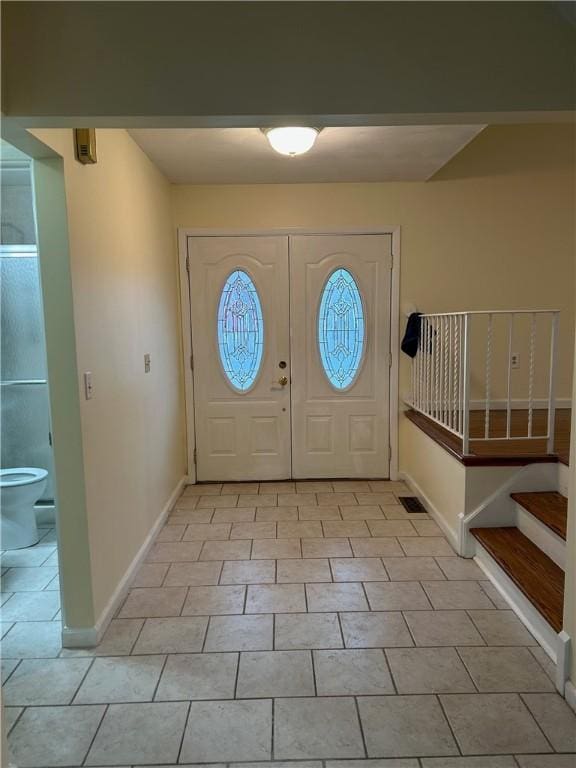 view of tiled entrance foyer