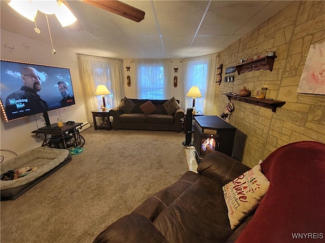 living room featuring carpet, plenty of natural light, and ceiling fan