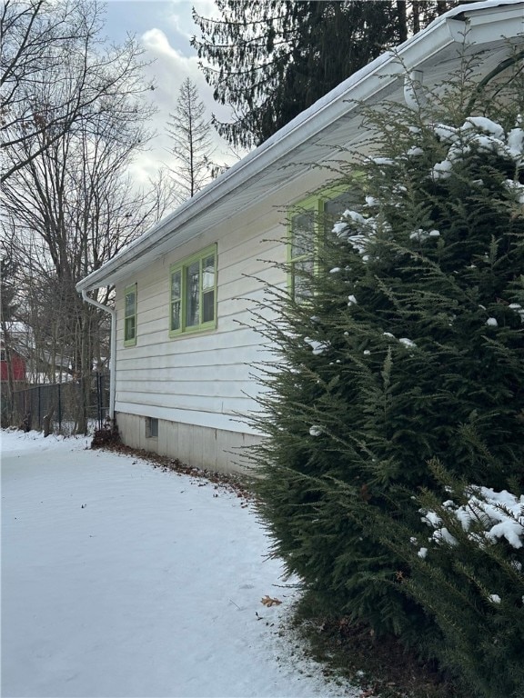 view of snow covered property