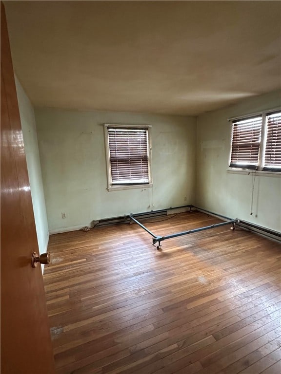 empty room featuring hardwood / wood-style floors