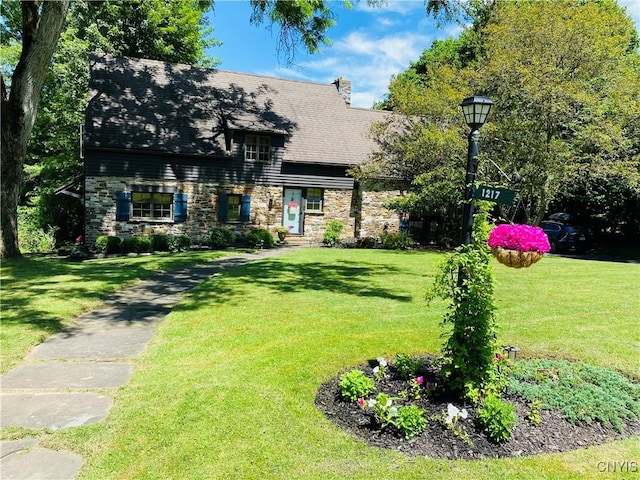 view of front of home with a front yard