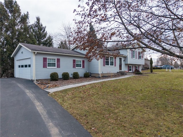 view of front facade featuring a garage and a front lawn