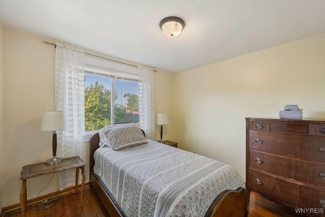 bedroom featuring dark hardwood / wood-style floors