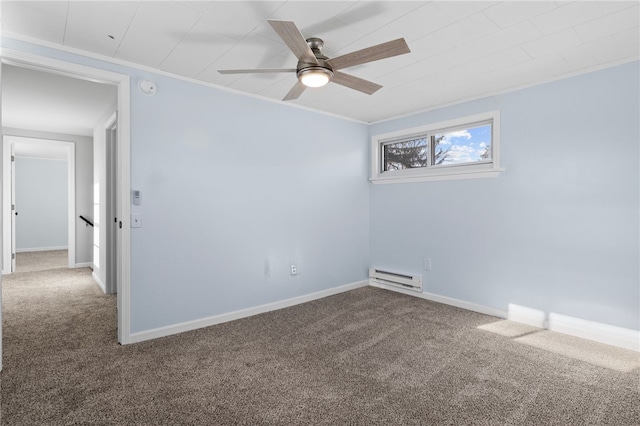 empty room with carpet, baseboard heating, crown molding, and ceiling fan