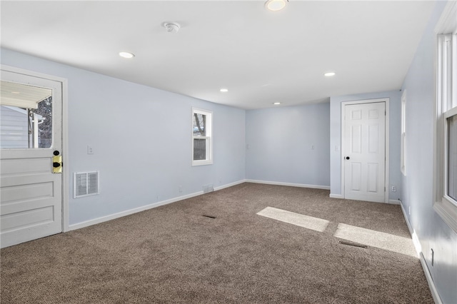 view of carpeted spare room