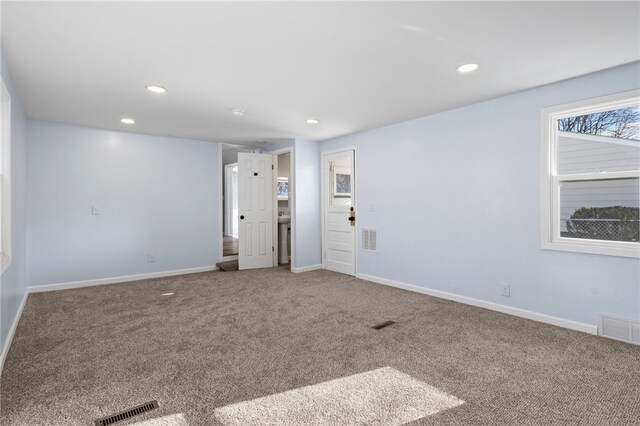 view of carpeted spare room