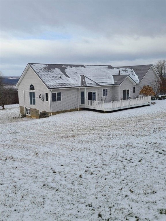 view of snow covered property