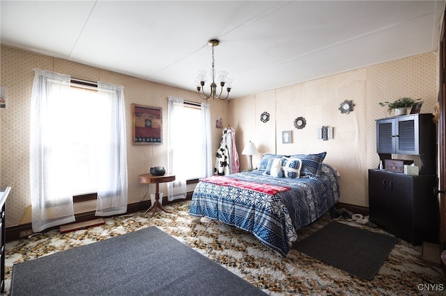 bedroom with a chandelier